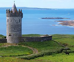 Doonagore Castle with a view to the Aran Islands